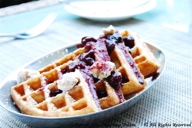 Waffles with Candied Walnuts, Berry Compote and Maple Syrup